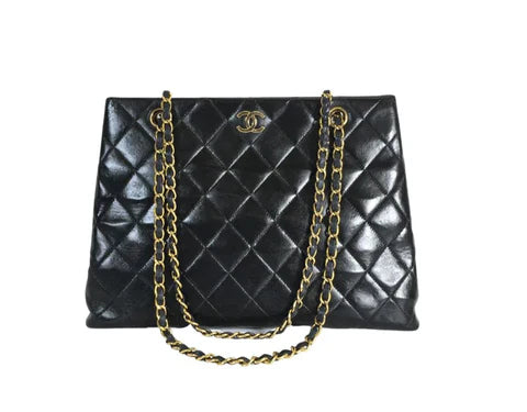 Chanel black quilted leather handbag with gold chain strap and CC logo hardware