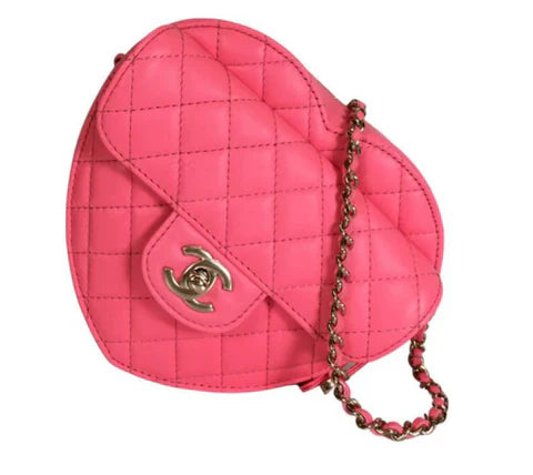 Chanel heart shaped quilted leather bag in pink with gold chain strap and gold CC logo clasp