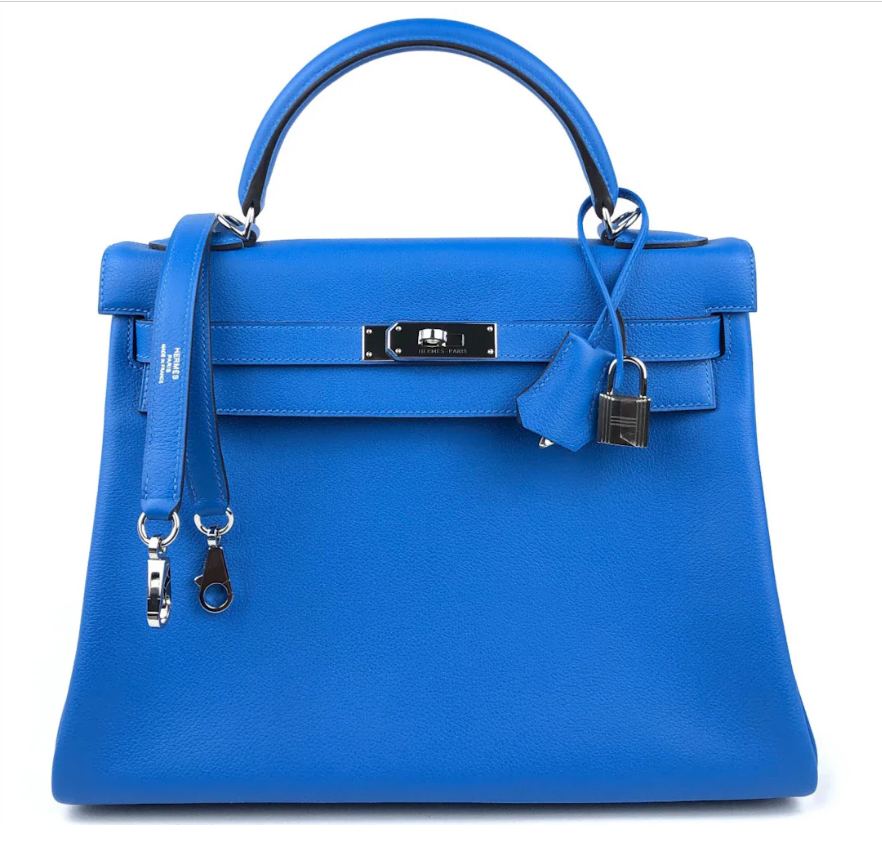 Hermès Kelly bag in bright blue leather with silver hardware and top handle