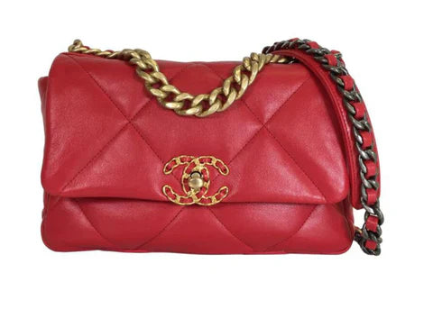 Chanel red quilted leather handbag with gold and black chain strap and gold hardware