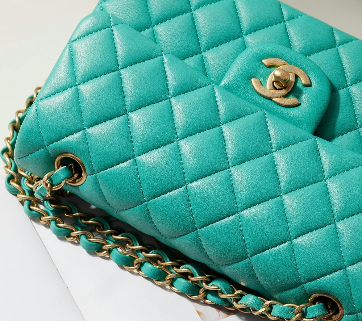 Chanel teal quilted leather handbag with gold chain strap and gold CC logo clasp