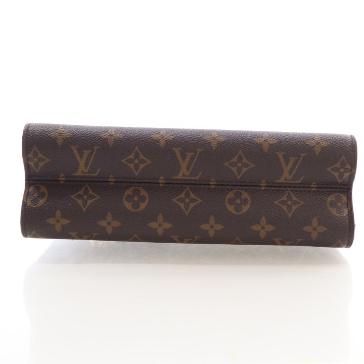 Pre-Owned Louis Vuitton Coated Canvas Monogram Victoire Handbag, base and feet view