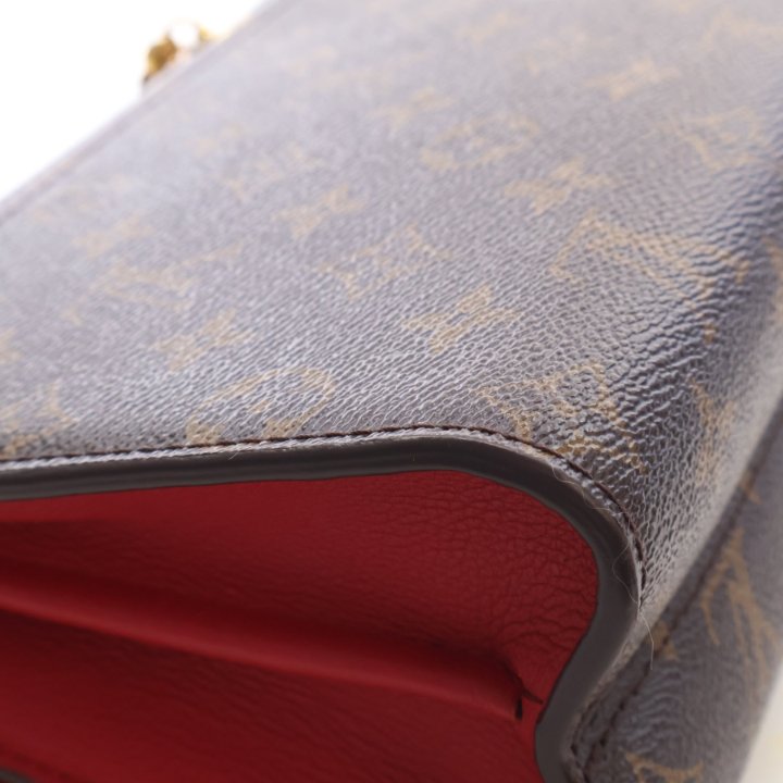 Pre-Owned Louis Vuitton Coated Canvas Monogram Victoire Handbag, corner and edge detail, photo 12 of 16