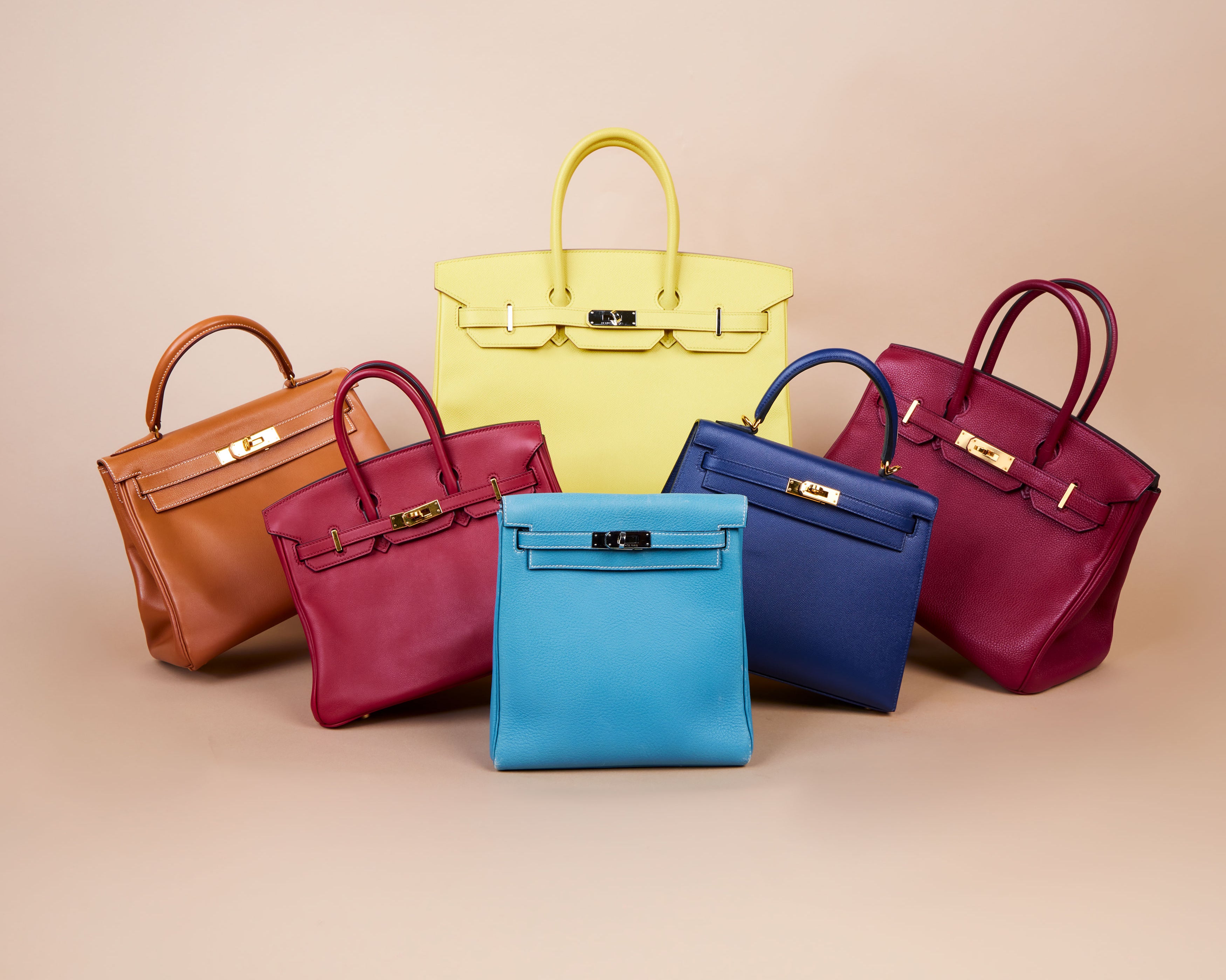 Hermès Birkin and Kelly bags in orange, pink, yellow, blue and burgundy