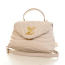 Louis Vuitton Calfskin Hold...