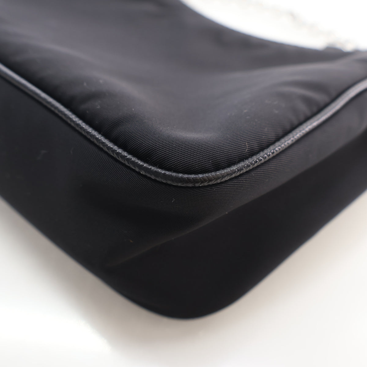 Pre-Owned Prada Mini Re-nylon Re-edition 2000, corner and edge detail, photo 15 of 18