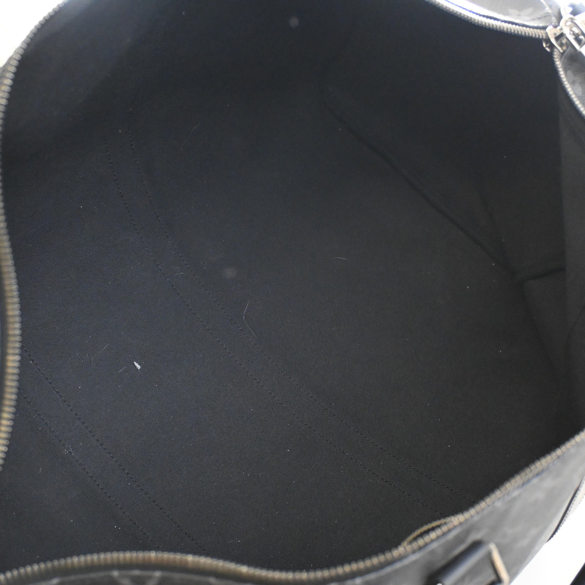 Pre-Owned Louis Vuitton 55 Monogram Eclipse Keepall, open interior with lining