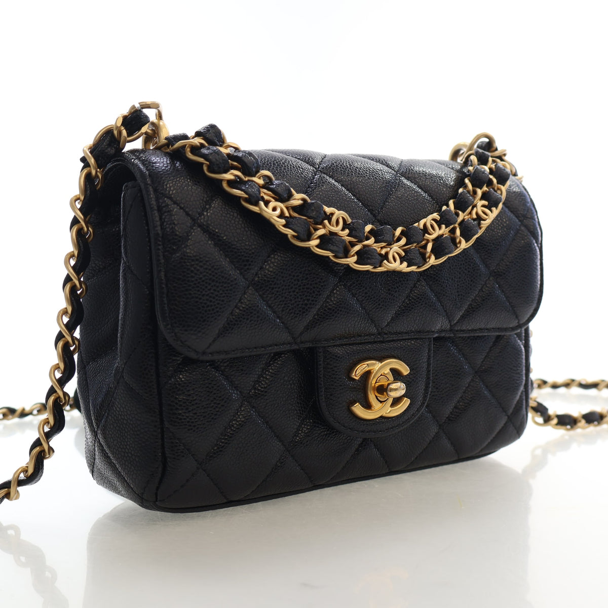 Pre-Owned Chanel Flap Bag Mini Caviar Leather Classic Single, three-quarter view, authenticated at Luxe Du Jour