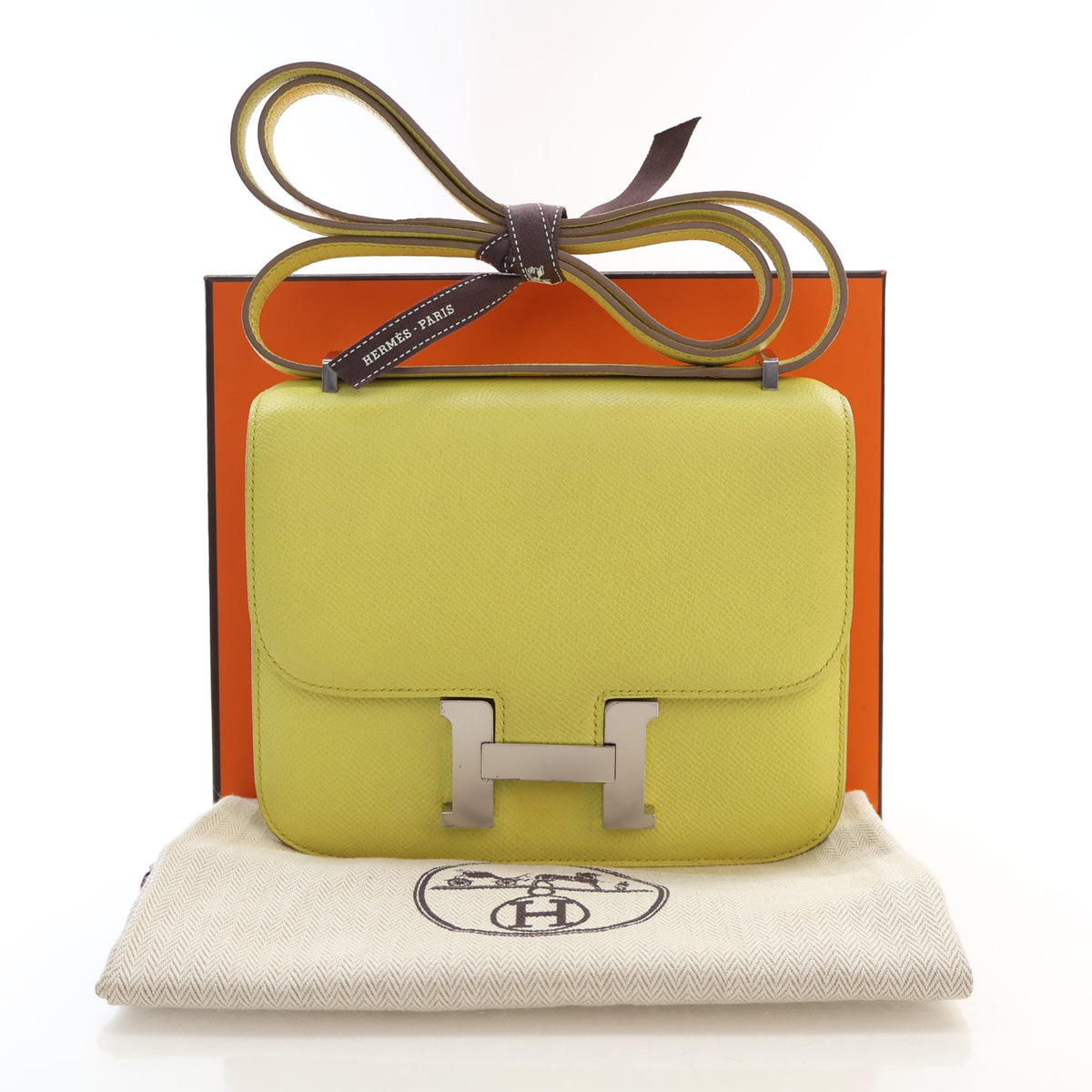 Pre-Owned Hermès Constance 18 Lime Epsom Leather, shown with dust bag and packaging