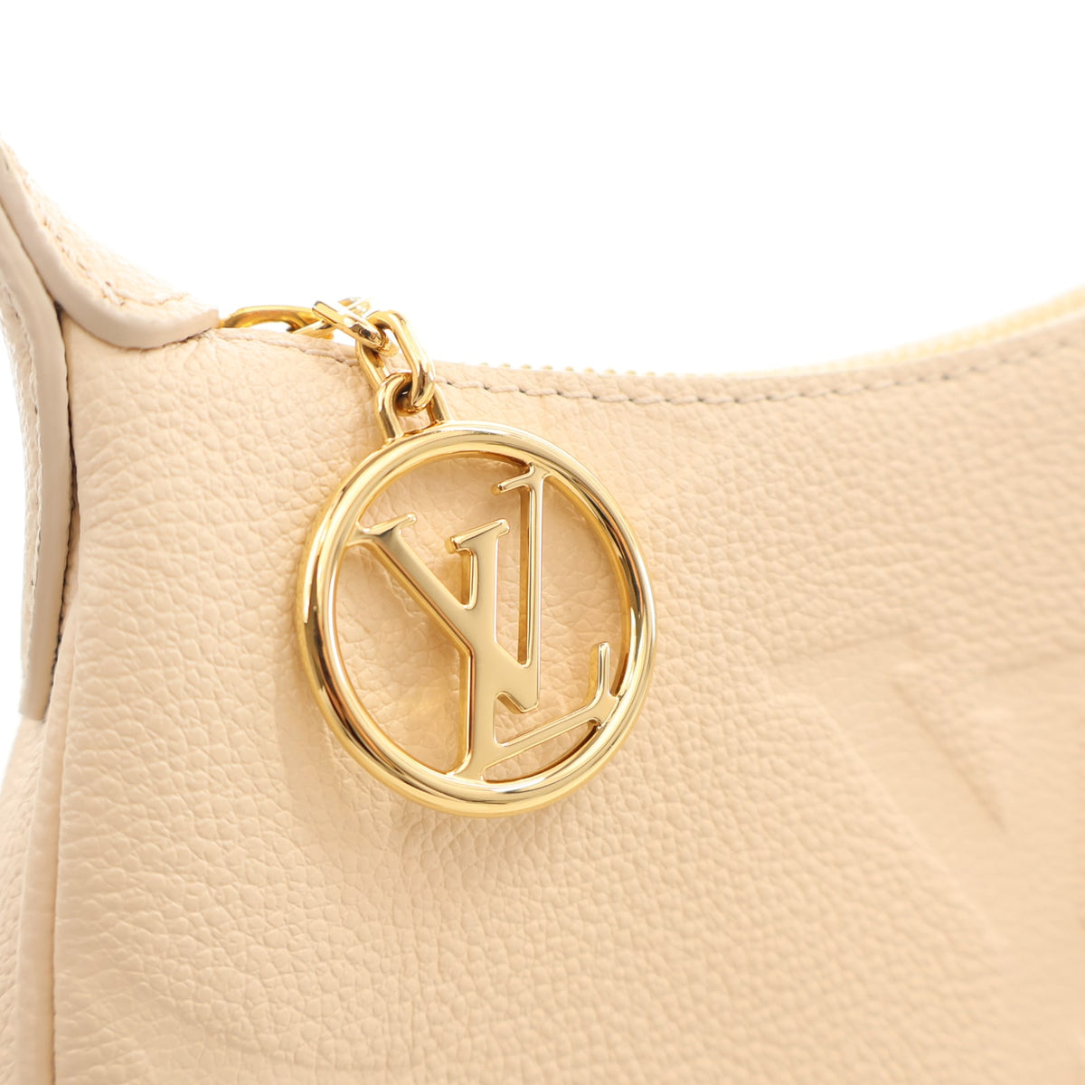 Pre-Owned Louis Vuitton Mini Monogram Empreinte Moon, gold hardware close-up