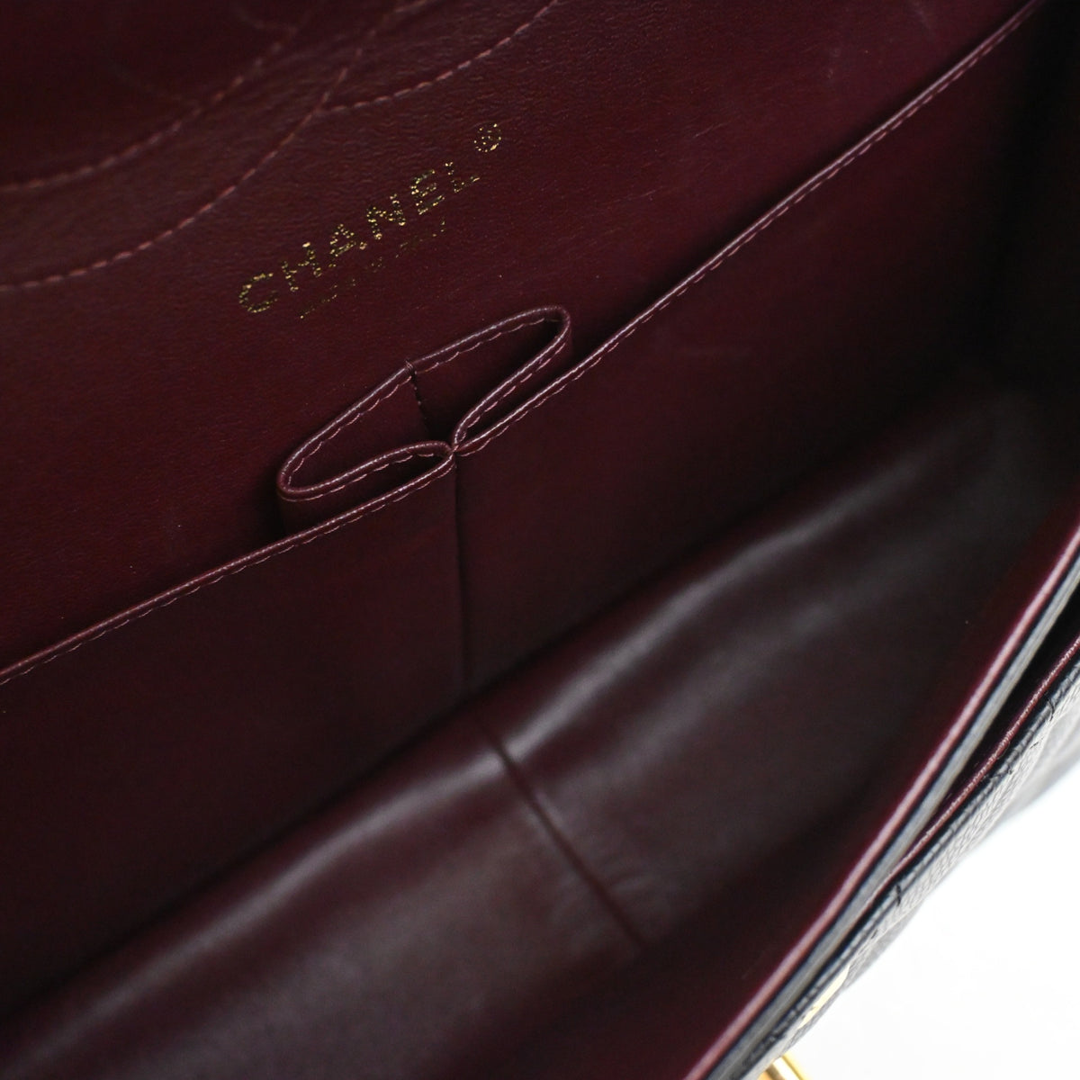 Pre-Owned Chanel Classic Double Flap Jumbo Caviar Leather Bag, open interior with lining