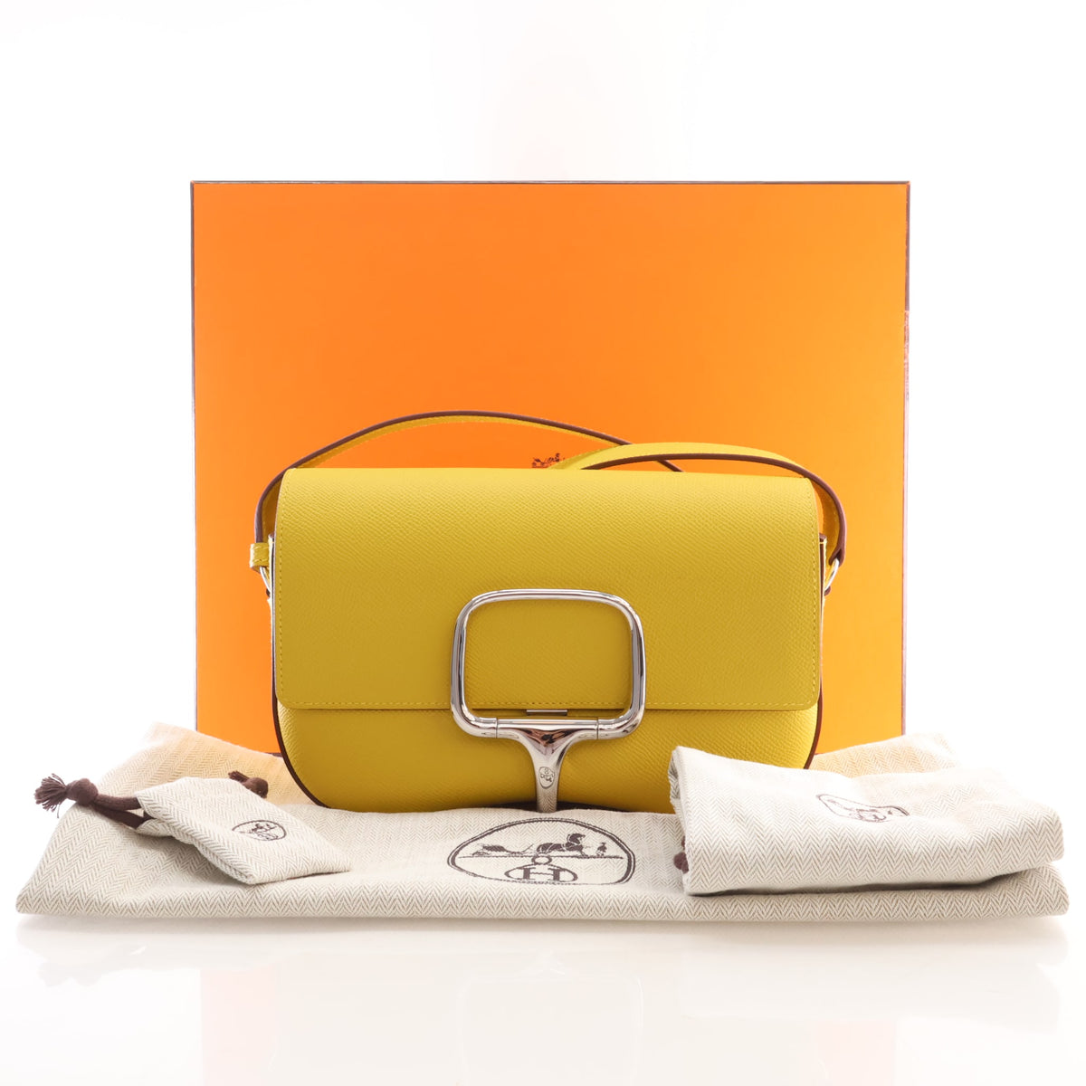 Pre-Owned Hermès Jaune De Naple Epsom Leather Della Cavalleria, shown with dust bag and packaging
