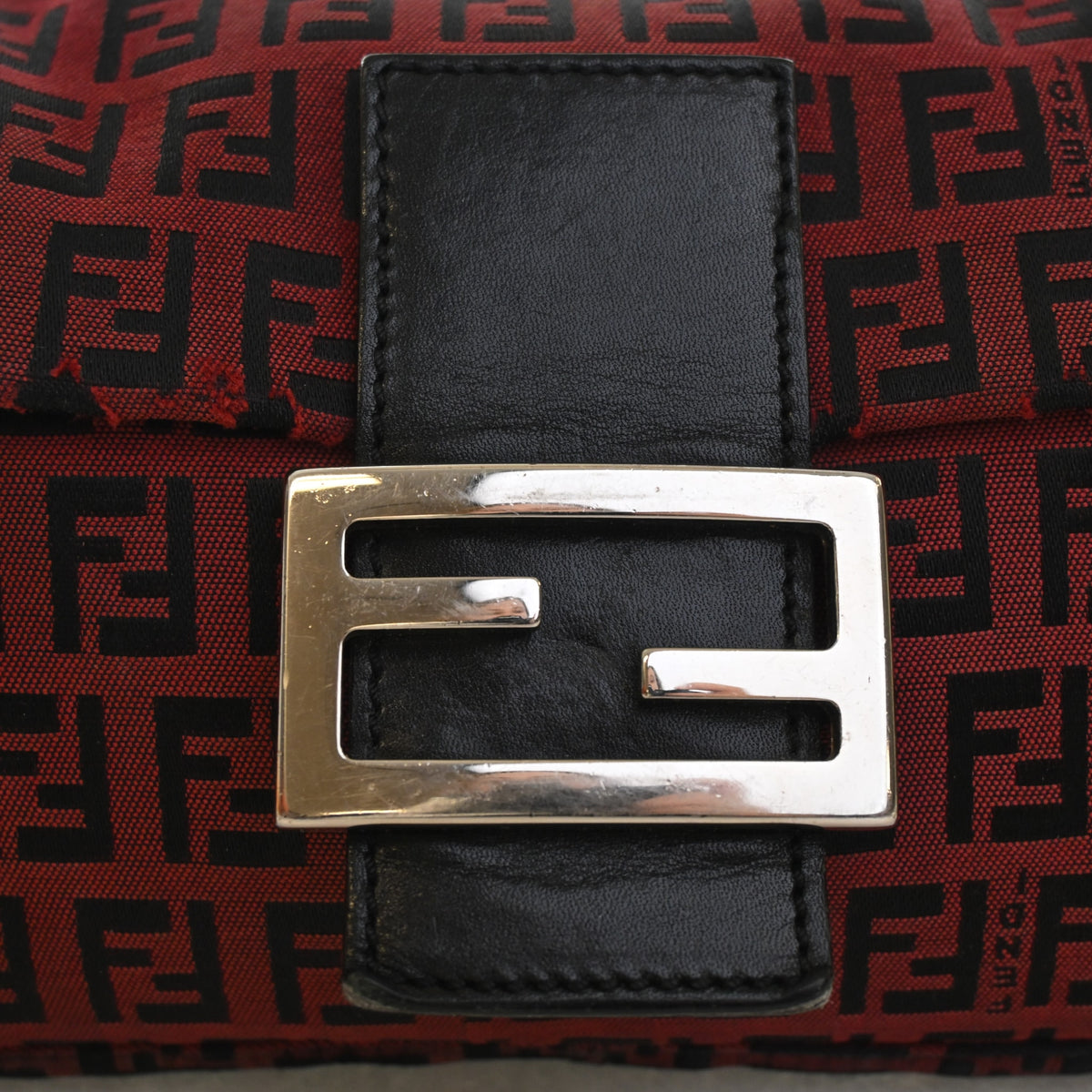 Pre-Owned Fendi Baguette Zucchino FF, silver hardware close-up