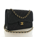 Chanel Jumbo Caviar Classic...