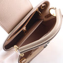 Louis Vuitton Studded Tauri...