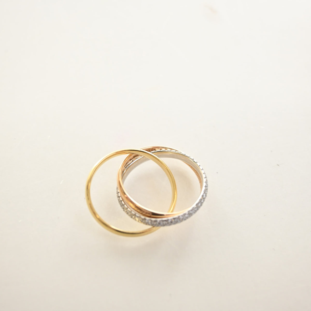 Pre-Owned Cartier Ring Small Diamonds Model Trinity Sz 50, three-quarter view