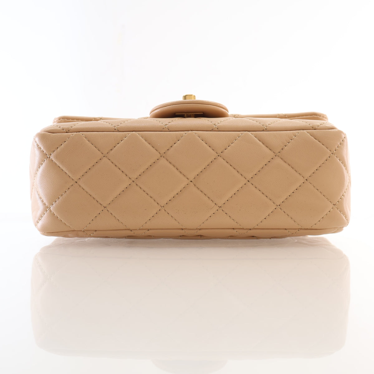 Pre-Owned Chanel Flap Bag Mini Lambskin Pearl Crush, base and feet view, photo 10 of 21