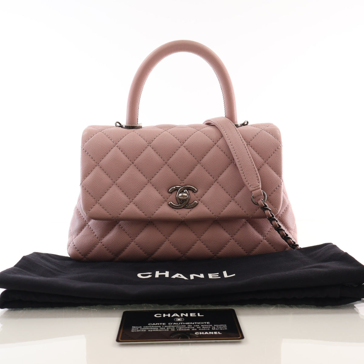 Pre-Owned Chanel Coco Handle Mini Caviar Leather Bag, shown with dust bag and packaging