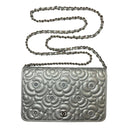 Product - Chanel Studded Em...