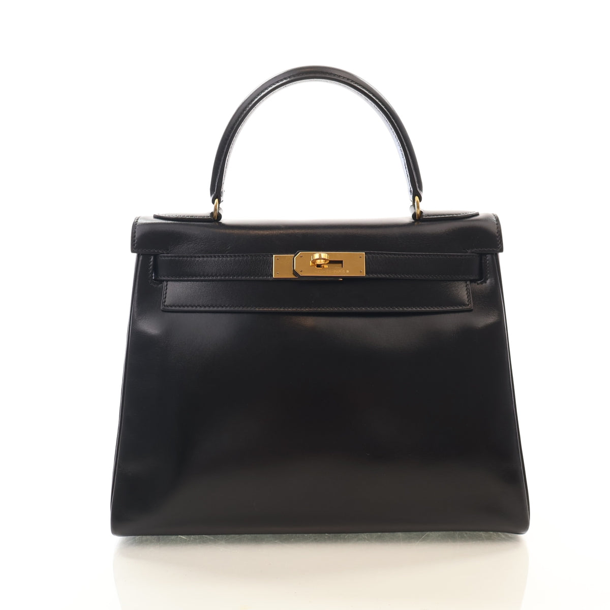 Vintage Hermès Kelly 28 Noir Box Calf, front view, authenticated at Luxe Du Jour