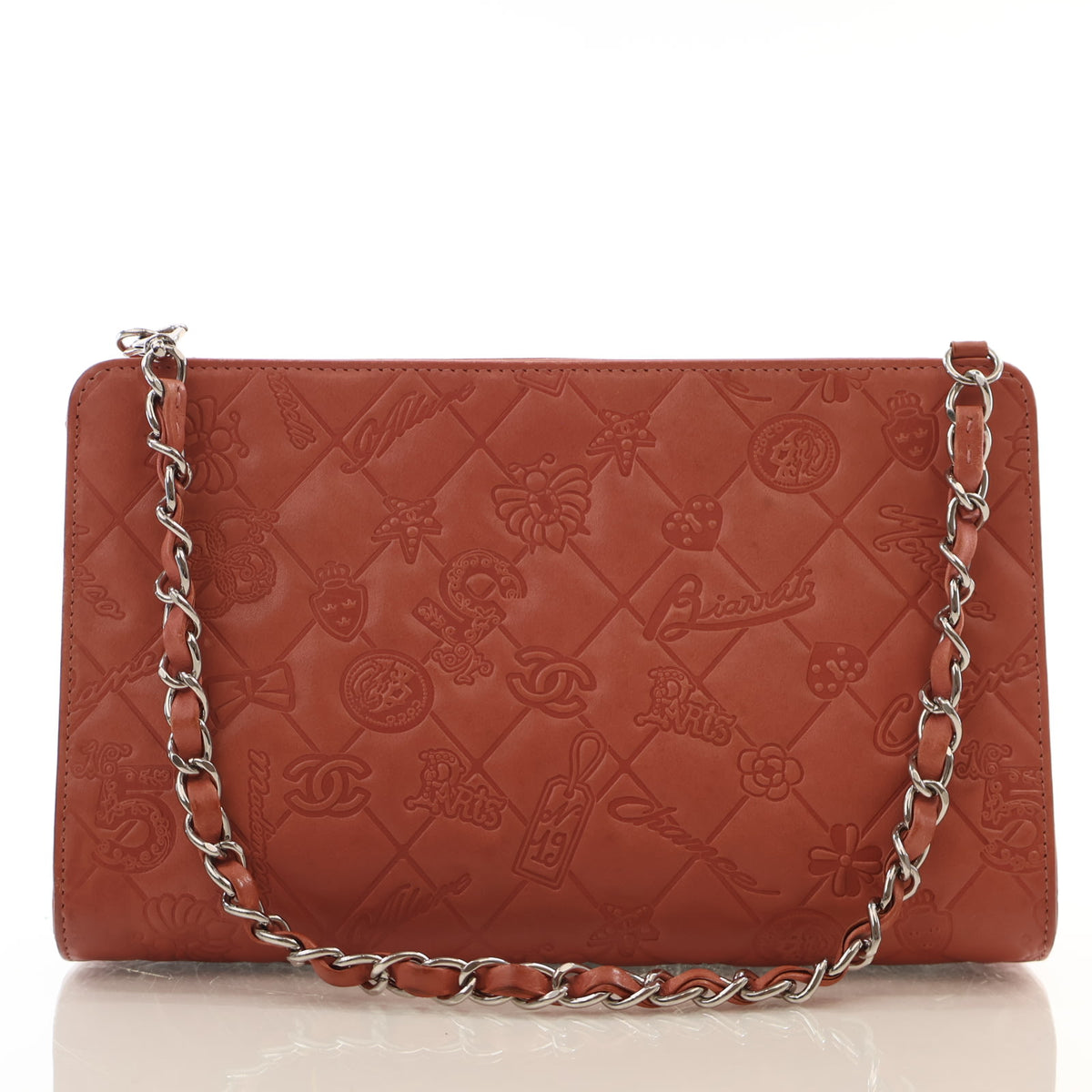 Pre-Owned Chanel Pochette Embossed Lambskin Lucky Symbols, front view, authenticated at Luxe Du Jour