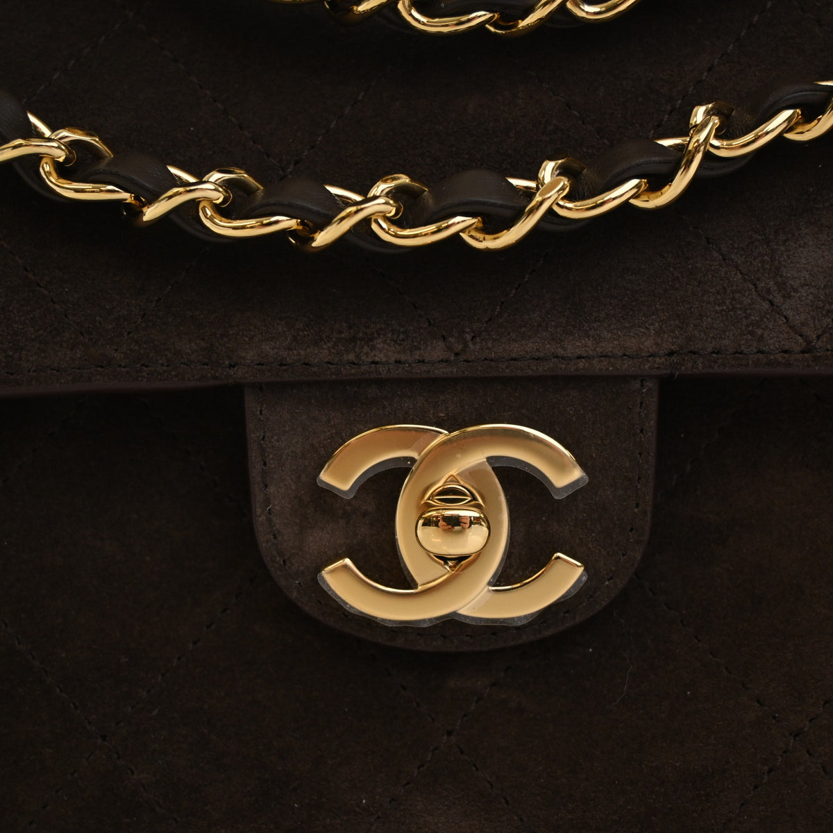 Pre-Owned Chanel Flap Bag Maxi Suede Leather, gold hardware close-up
