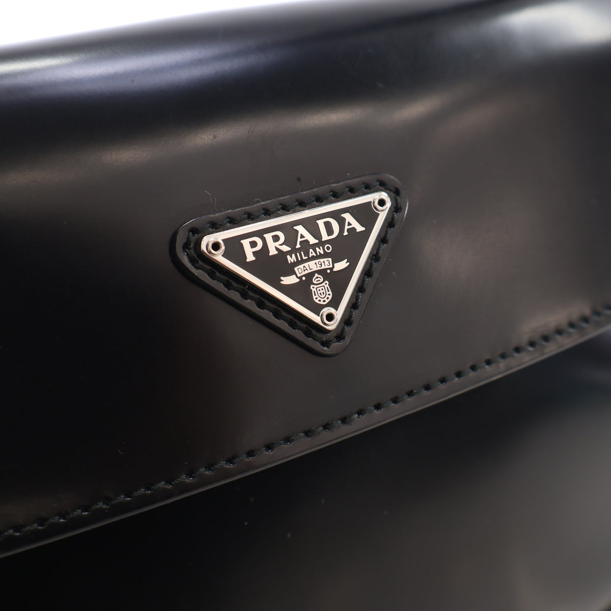 Pre-Owned Prada Flap Bag Small Spazzolato Cleo, silver embossed logo detail