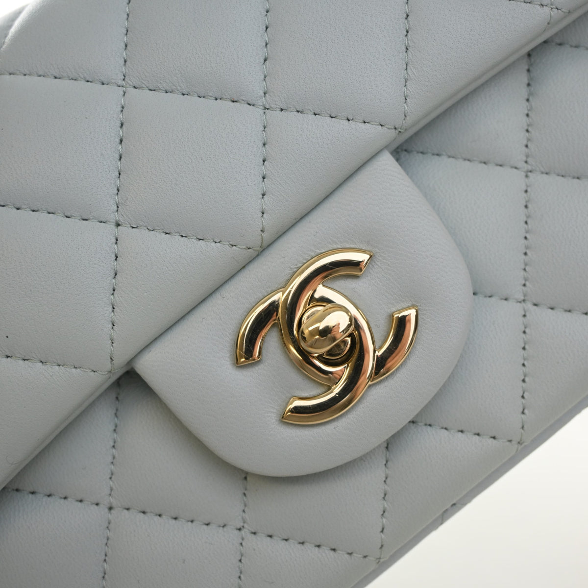 Pre-Owned Chanel Classic Flap Mini Lambskin Rectangular Top Handle Bag, gold hardware close-up