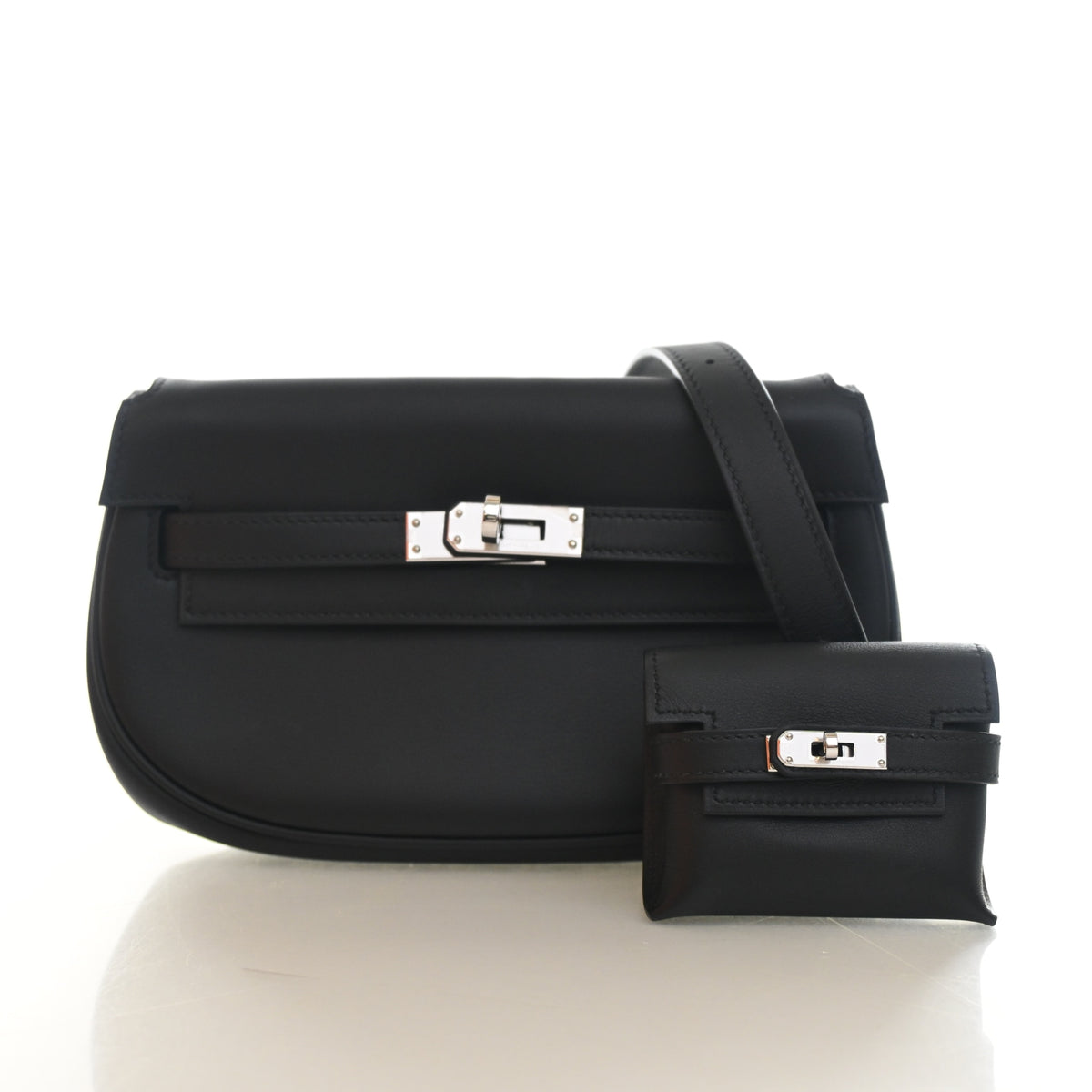 Pre-Owned Hermès Kelly Noir Swift Leather Moove, front view, authenticated at Luxe Du Jour