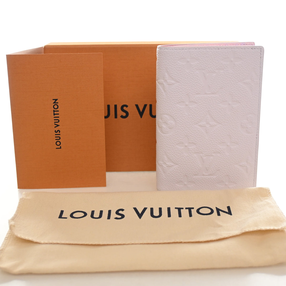 Pre-Owned Louis Vuitton Monogram Empreinte Passport Holder, shown with dust bag and packaging