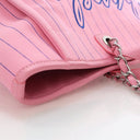 Chanel Large Pinstriped Can...