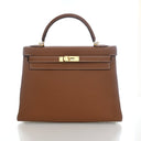 Product - Hermes Gold Togo ...