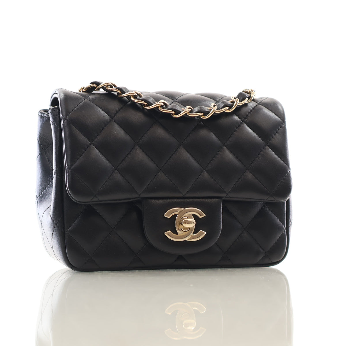 Pre-Owned Chanel Classic Flap Mini Lambskin Square Bag, three-quarter view, authenticated at Luxe Du Jour
