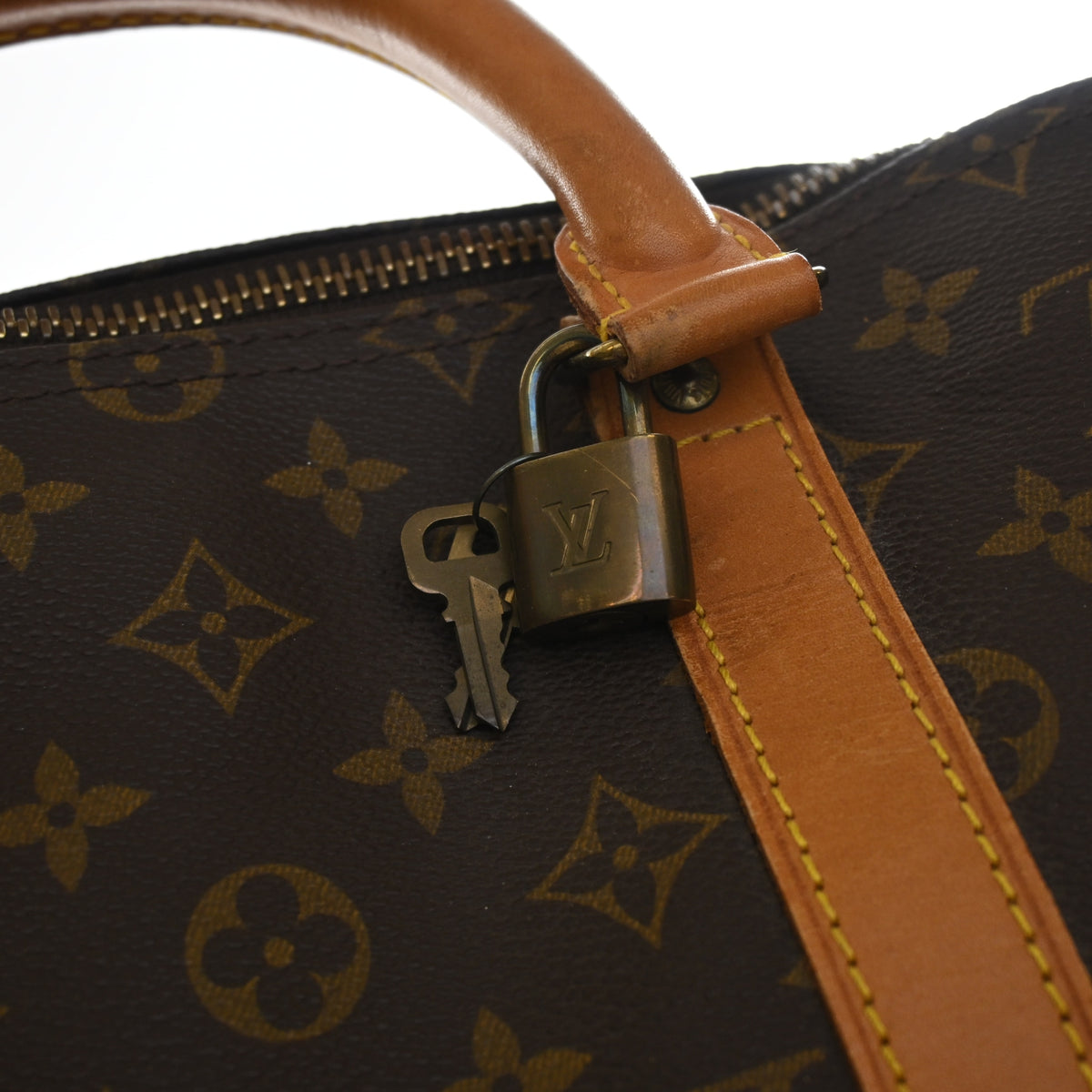 Vintage Louis Vuitton 50 Monogram Keepall, gold hardware close-up, photo 17 of 19