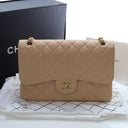 Chanel Jumbo Caviar Classic...