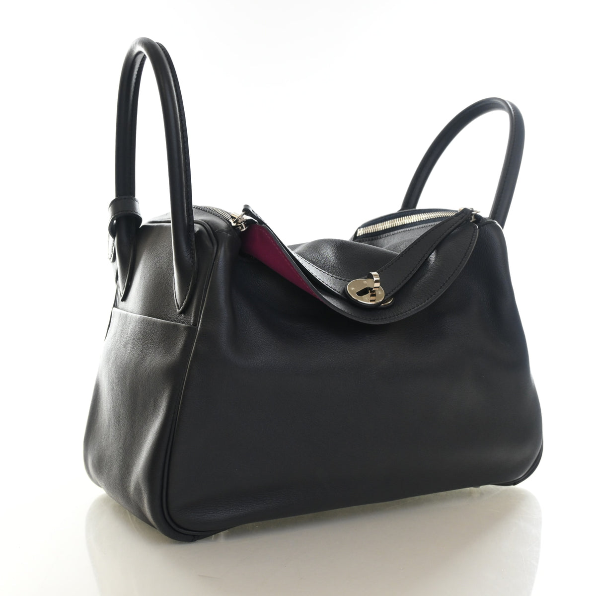 Pre-Owned Hermès Lindy 30 Bleu Nuit Swift Leather Verso, side profile, authenticated at Luxe Du Jour