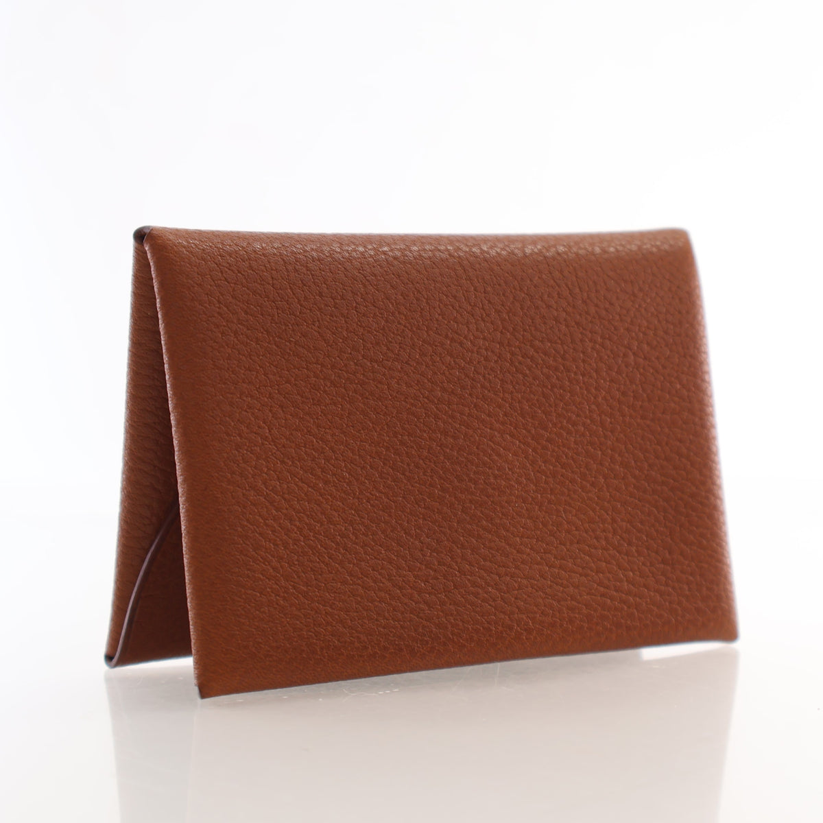 Pre-Owned Hermès Card Holder Fauve Barenia Leather Calvi Duo, side profile, authenticated at Luxe Du Jour