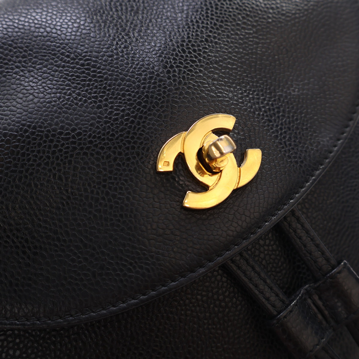 Vintage Chanel Backpack Caviar Leather Triple CC, gold hardware close-up