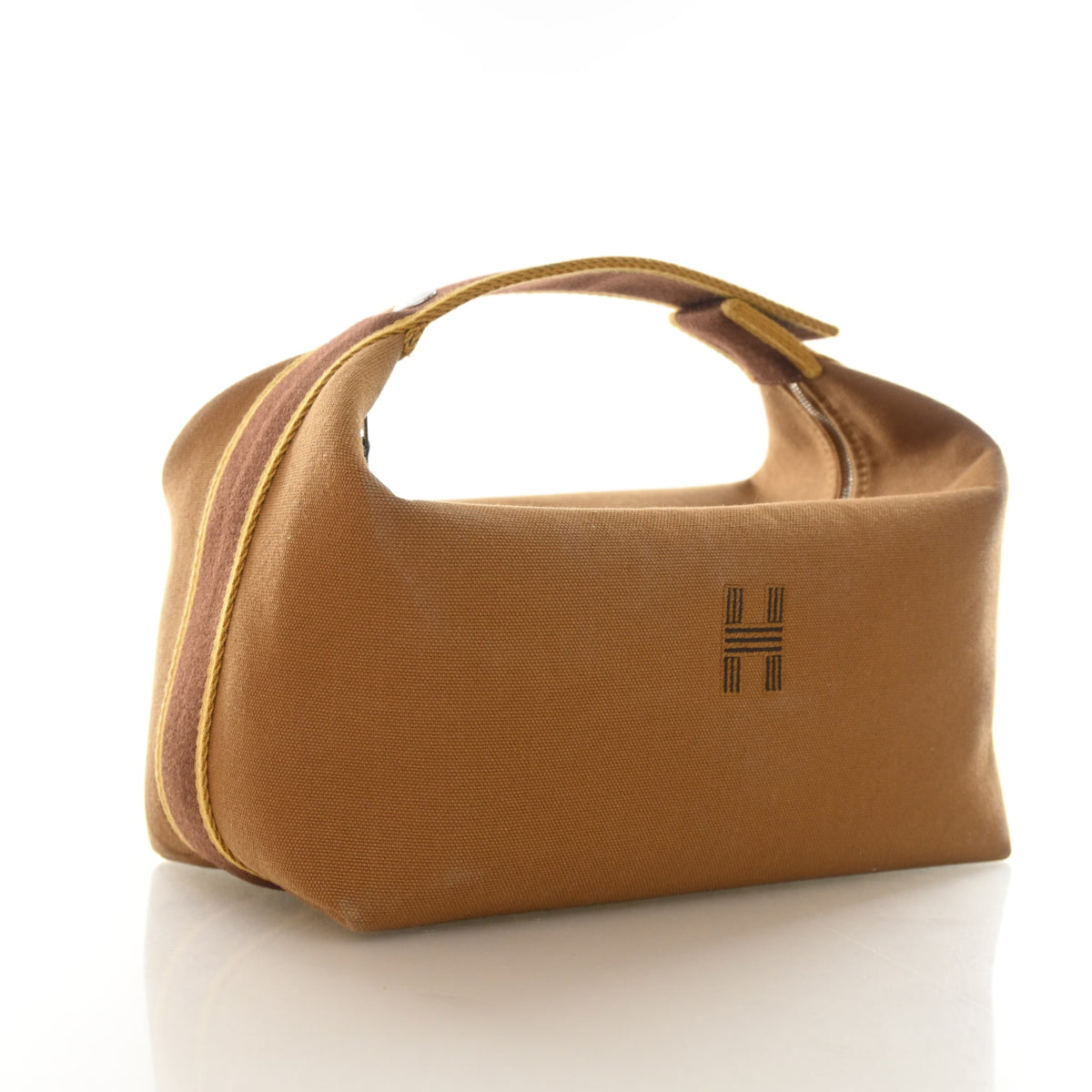 Pre-Owned Hermès Case Large Ocre Toile Bride A Brac Model, side profile, authenticated at Luxe Du Jour