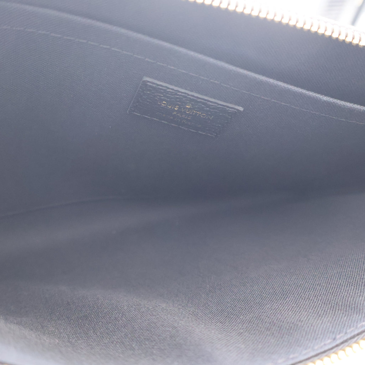 Louis Vuitton Daily Monogram Empreinte Pouch, photo 14 of 17