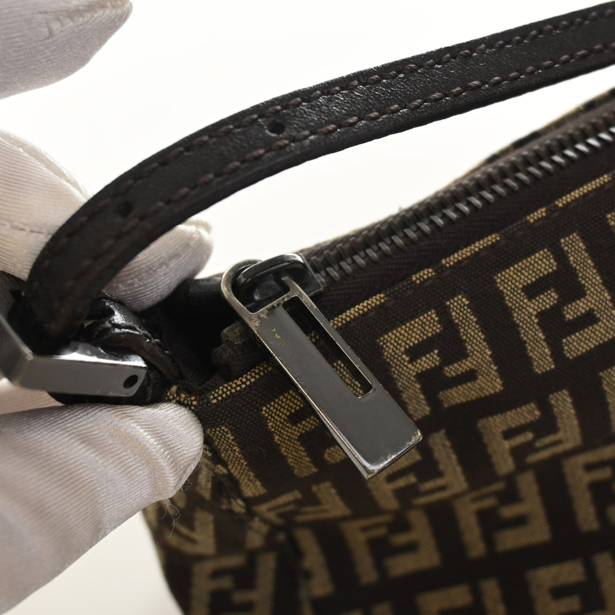 Pre-Owned Fendi Pochette Monogram Zucchino, silver hardware close-up
