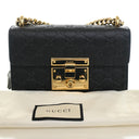 Gucci Small Guccissima Padl...