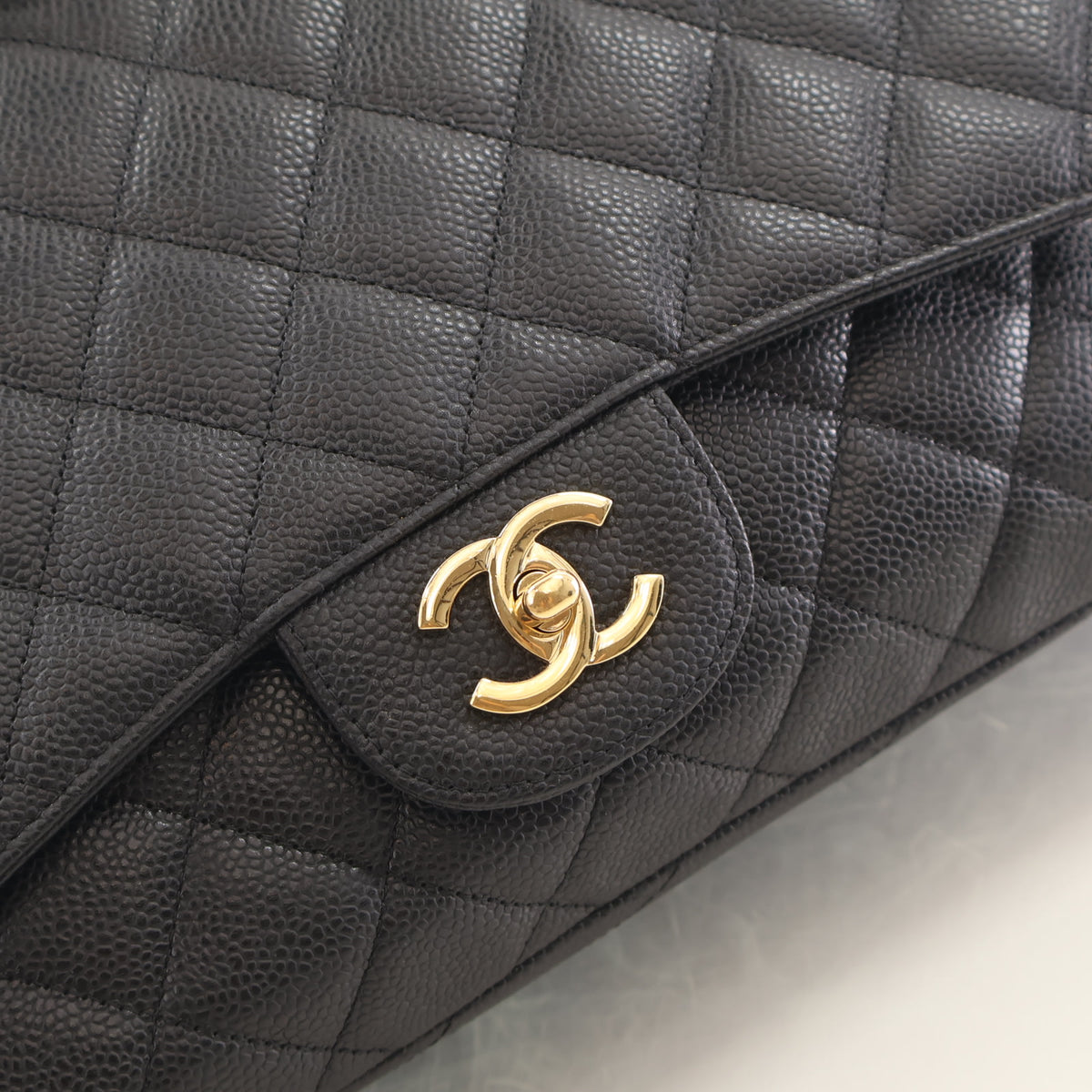 Pre-Owned Chanel Flap Bag Maxi Caviar Leather Classic Single, gold embossed logo detail