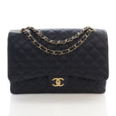 Product - Chanel Maxi Cavia...