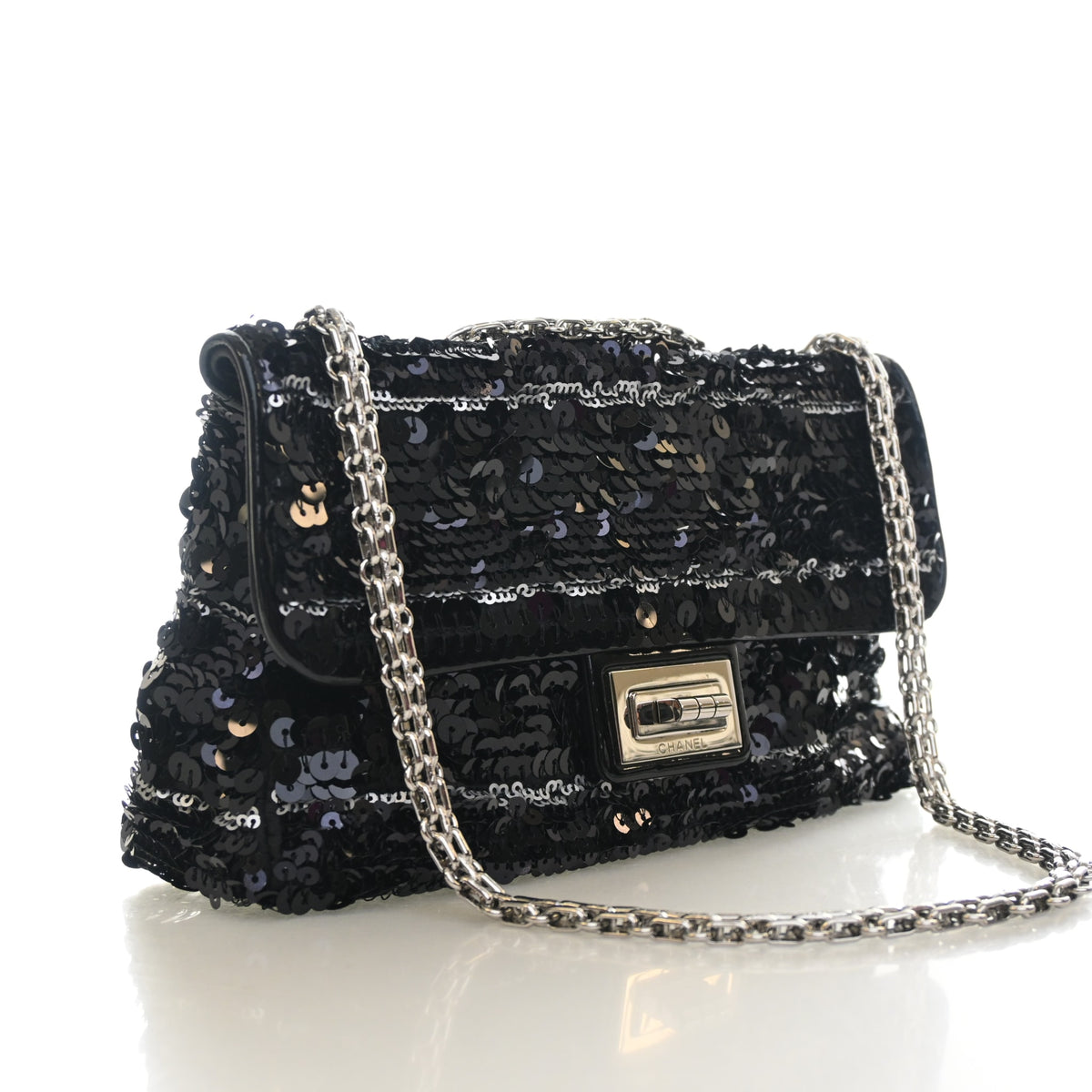 Pre-Owned Chanel Flap Bag 224 Sequin Reissue 2.55, three-quarter view, authenticated at Luxe Du Jour