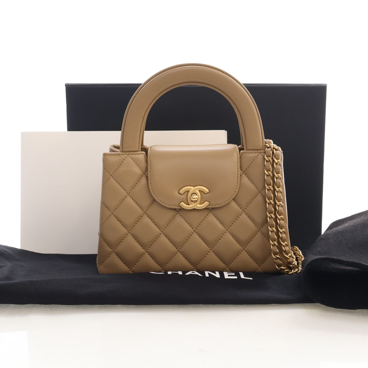 Pre-Owned Chanel Kelly Nano Lambskin Shopper, shown with dust bag and packaging