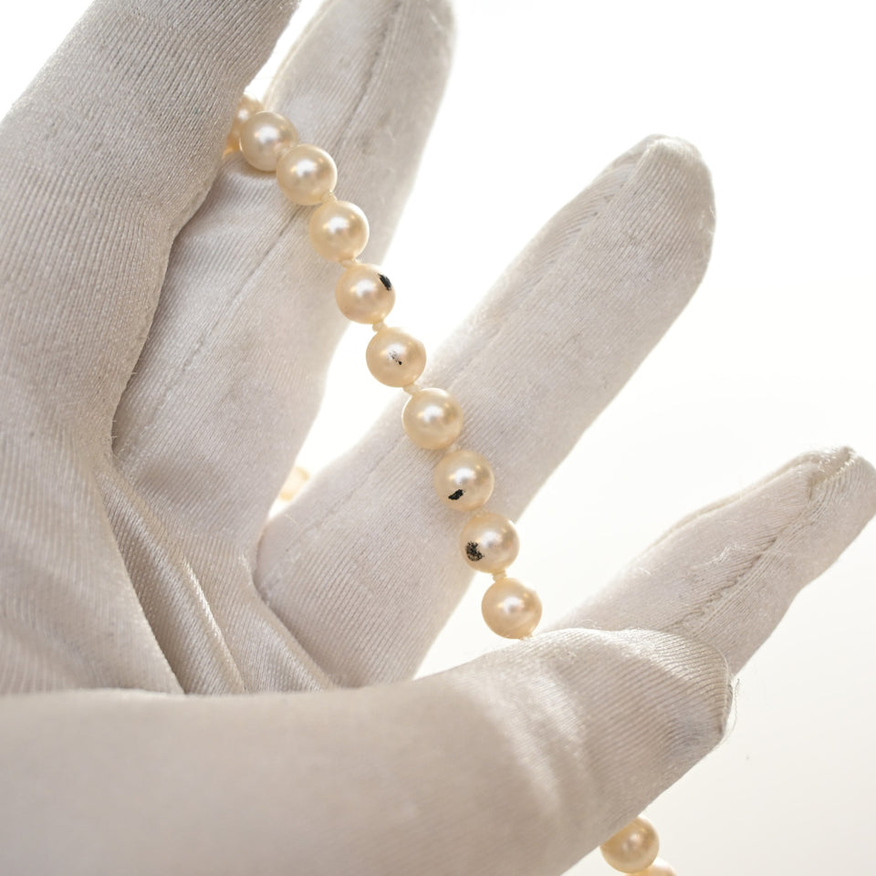 Chanel CC Long Pearl Necklace