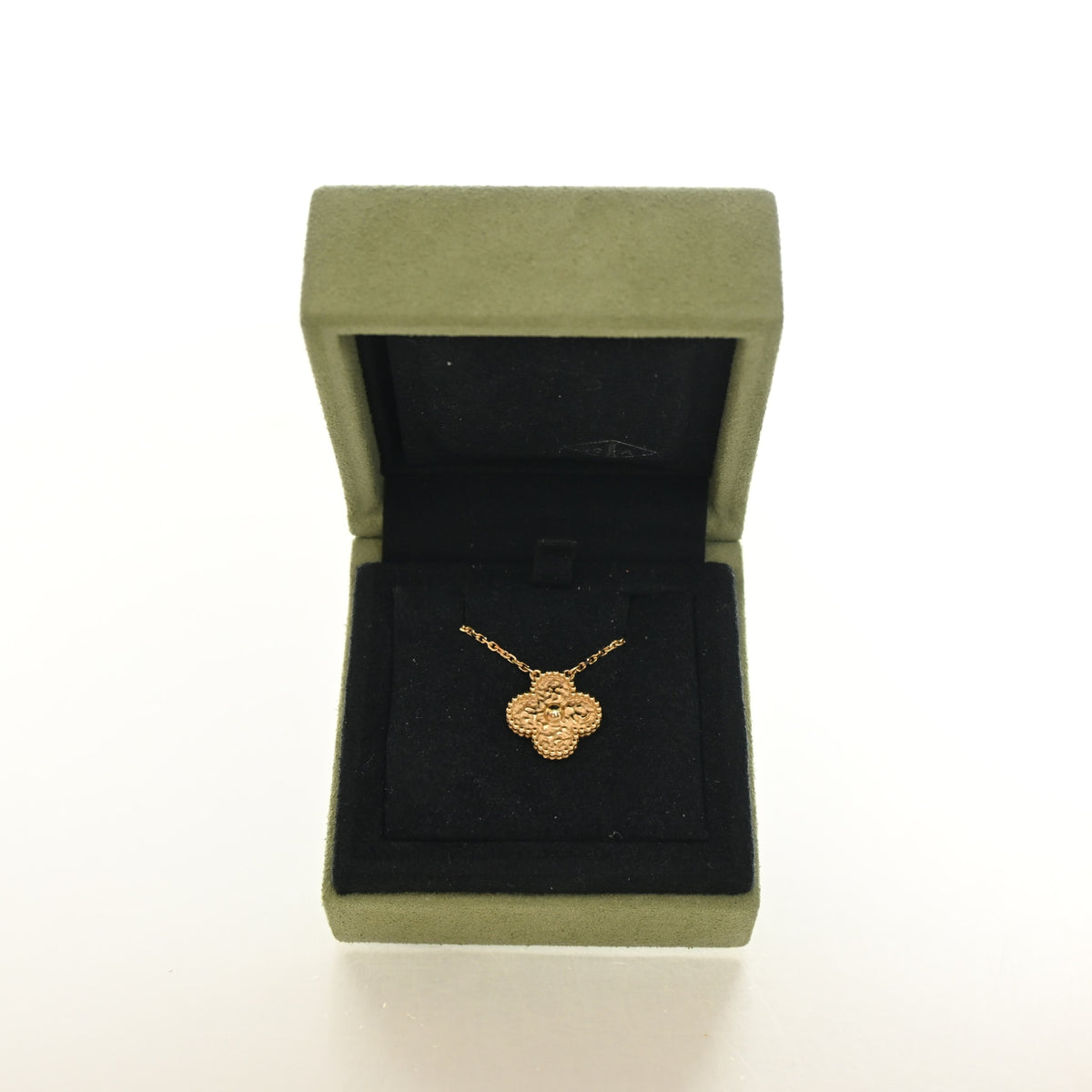 Vintage Van Cleef & Arpels Alhambra 18K Yellow Gold Pendant, shown with dust bag and packaging, authenticated at Luxe Du Jour