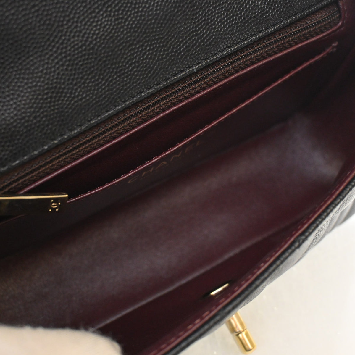 Pre-Owned Chanel Classic Flap Mini Caviar Leather Rectangular Bag, open interior with lining