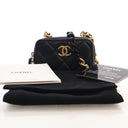 Chanel Mini Lambskin Wallet...